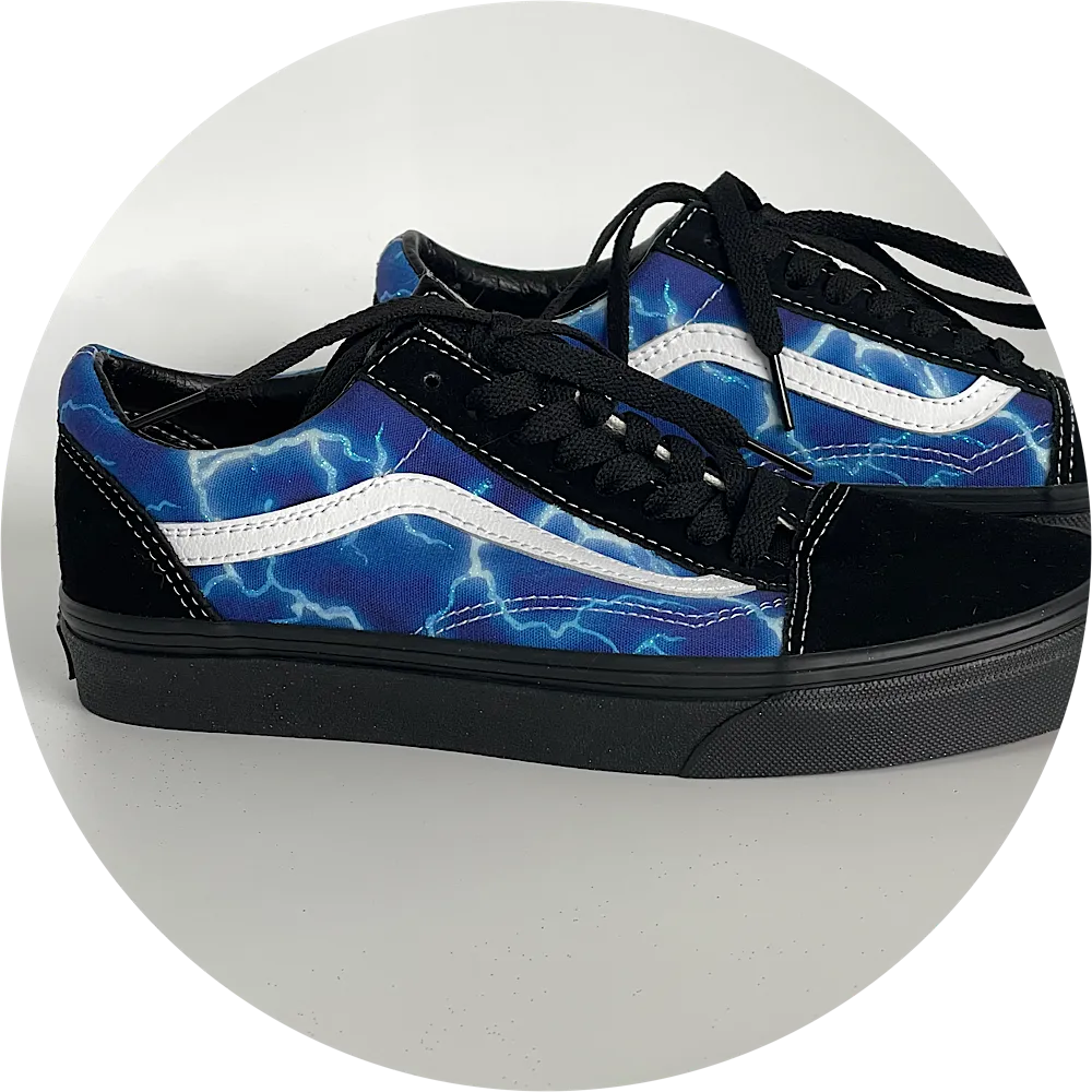 Blue, White, and Black Glittered Vans Old Skool's