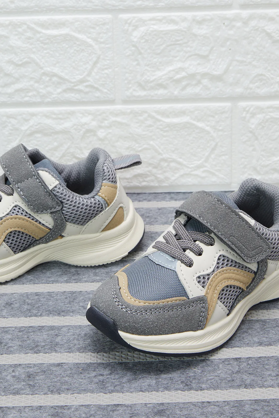 Grey Multi-Piece Trainer