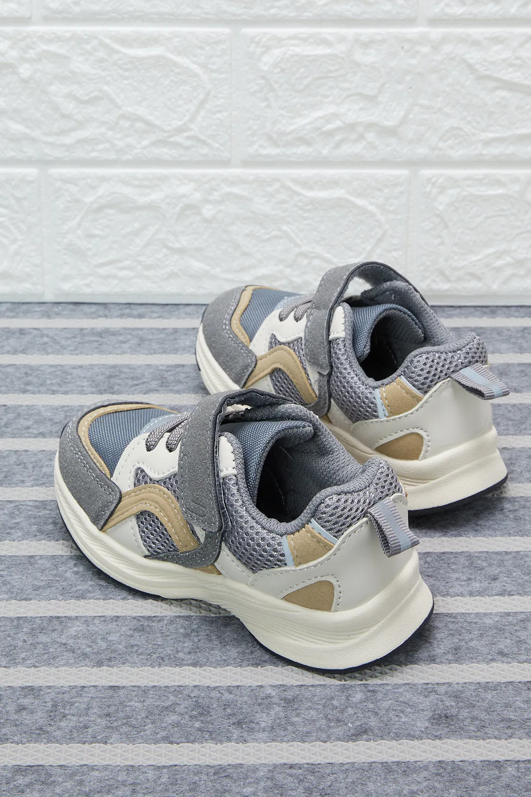 Grey Multi-Piece Trainer